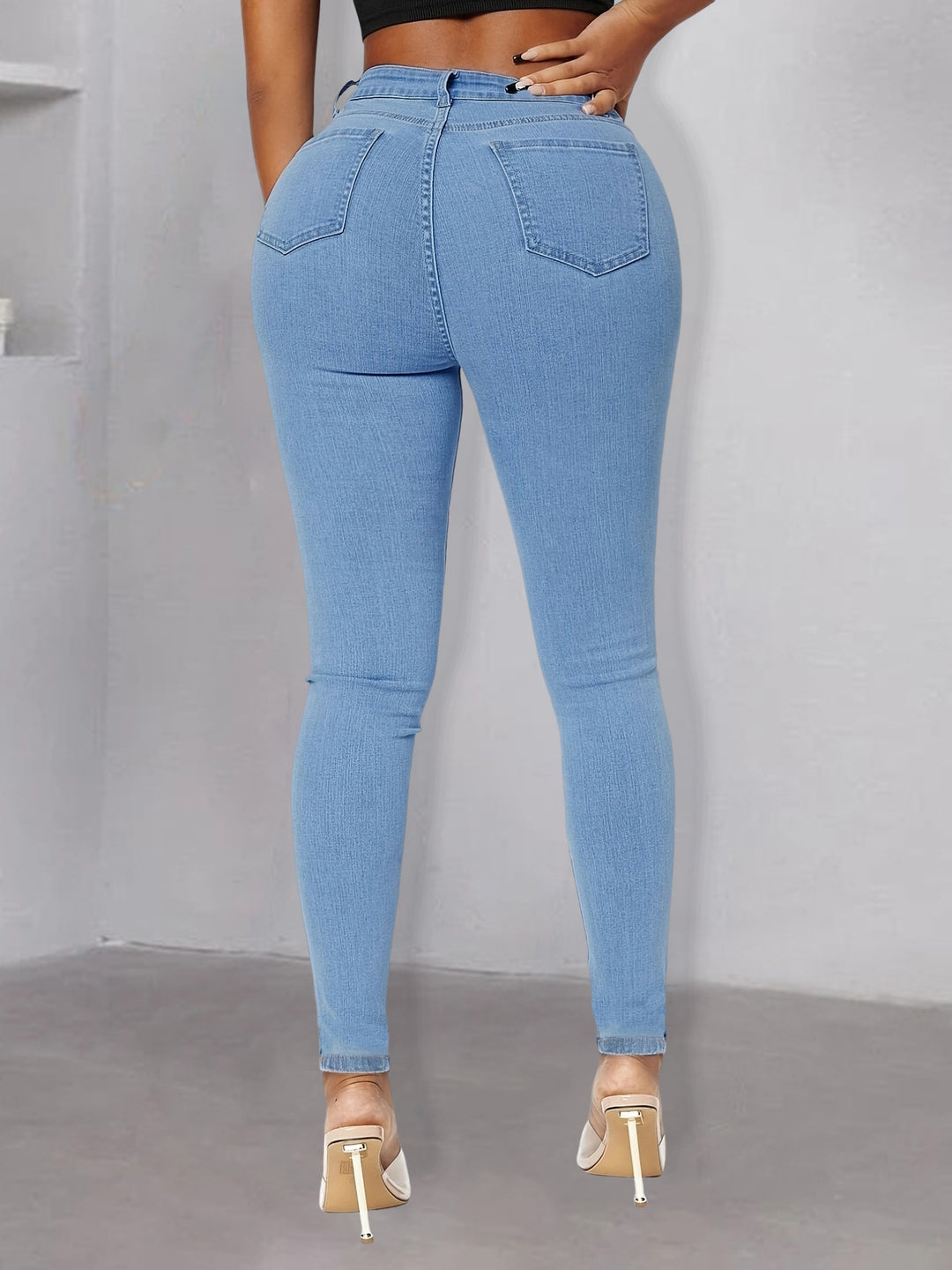 Women pearl-embellished high-waist skinny jeans with knee cutouts Amarae