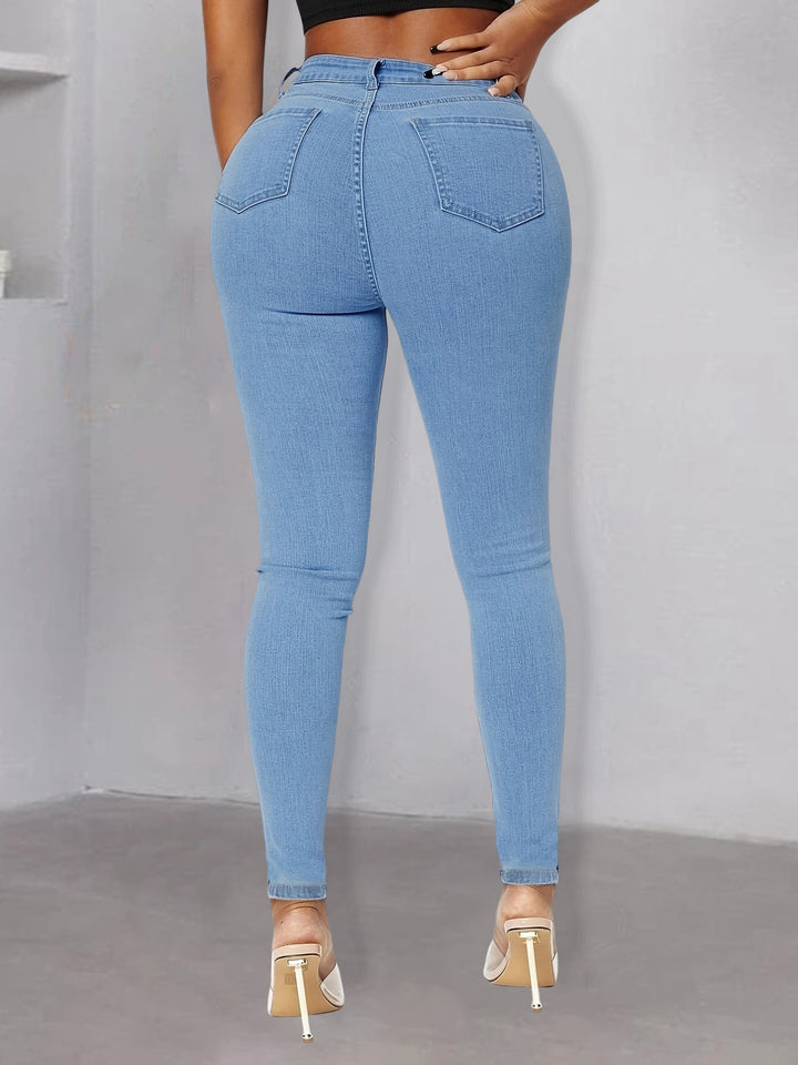 Women pearl-embellished high-waist skinny jeans with knee cutouts Amarae