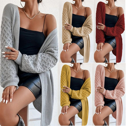Knitted cardigan for women with an asymmetrical design and deep pockets Amarae