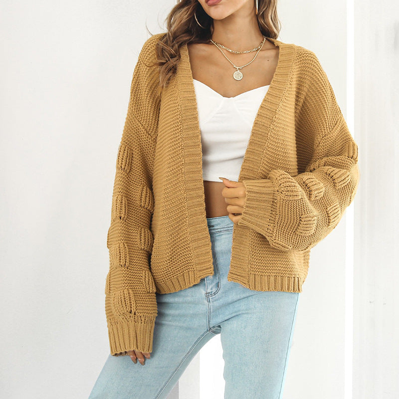 Ladies Large knit cardigan with voluminous sleeves and modern chic patterns and style