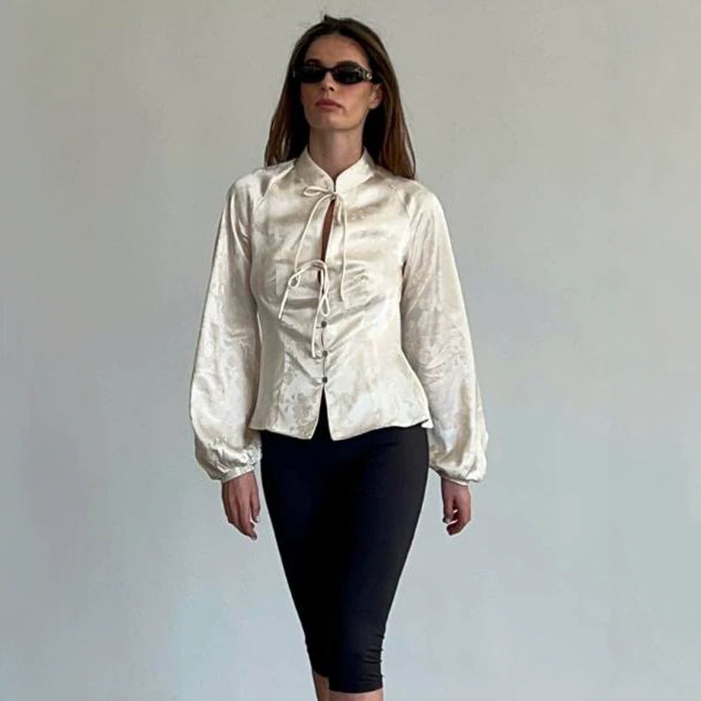 Women Jacquard Satin Blouse with Stand-up Collar, Ties and Fitted Peplum Amarae