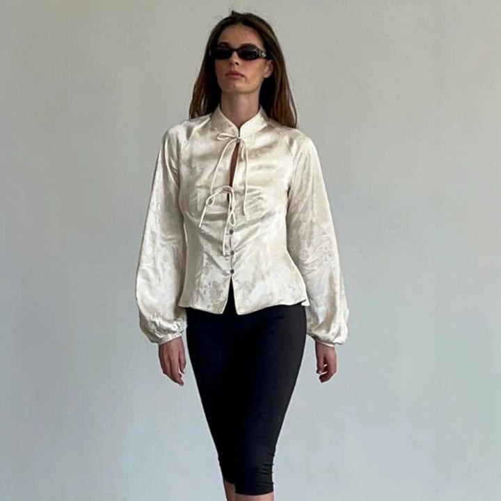 Women Jacquard Satin Blouse with Stand-up Collar, Ties and Fitted Peplum Amarae