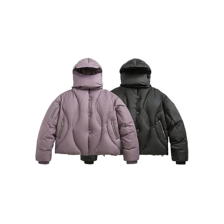 Unisex Short padded puffer jacket with high closing collar, voluminous hood and zippered pockets Amarae