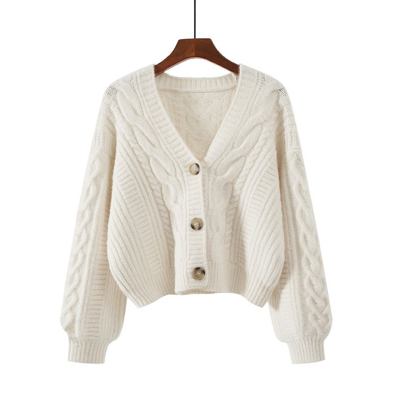 Cardigan de mode pour femmes avec motif en maille torsadée et détails de bouton extravagants Chic & Stil