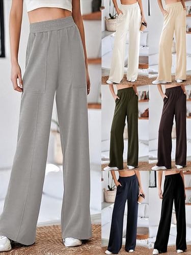Loose sports pants for women with elastic waistband and practical side pockets Amarae