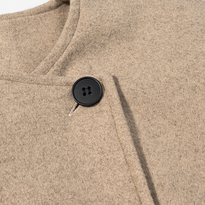 Veste courte élégante pour dames au design moderne avec coupe asymétrique Chic & Stil