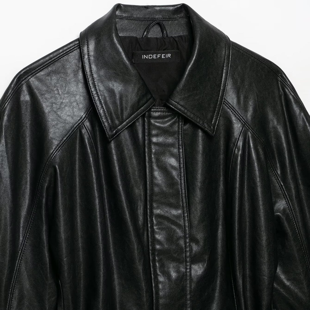 Women's short jacket made of vegan leather with a waist tie belt and dropped raglan sleeve construction Amarae