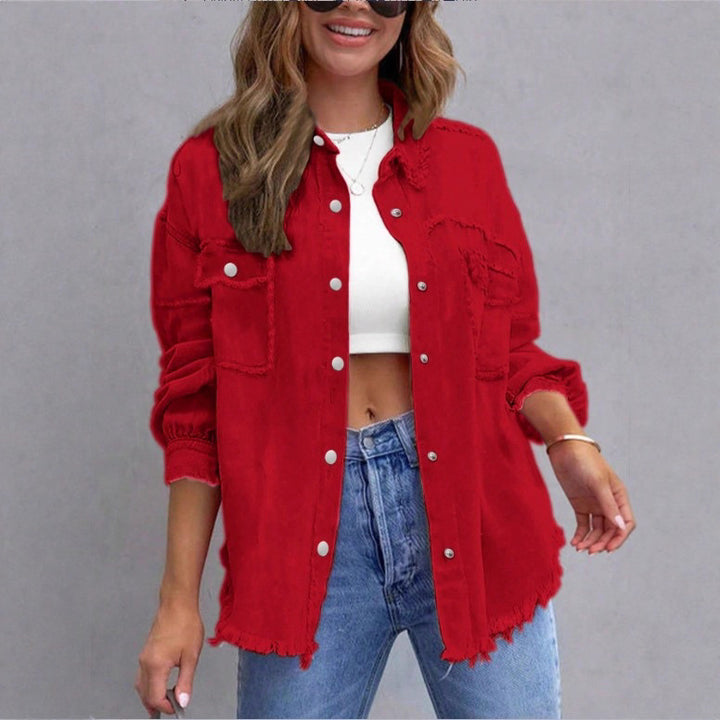 Women's oversized denim shirt jacket with fringe trim, flap pockets, and snap front Amarae