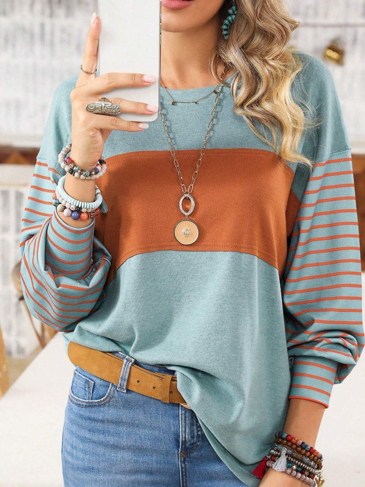 Women's Loose Colorblock Sweatshirt with Striped Sleeves and Round Neck Amarae