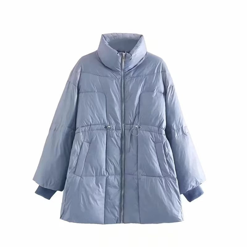 Quilted transition jacket for women with high collar and practical side pockets Lune London