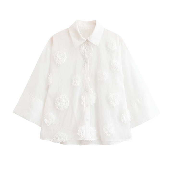 Women's blouse with three-quarter sleeves and three-dimensional flower appliqués Amarae