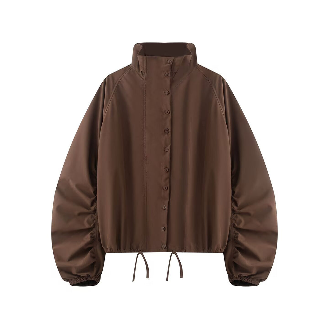 Women's transitional jacket with wide balloon sleeves, stand-up collar and drawstring.
