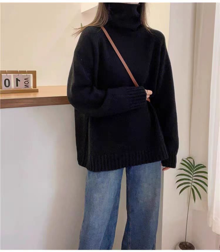 Pull en tricot épais pour femmes avec col montant et fentes sur les côtés Chic & Stil