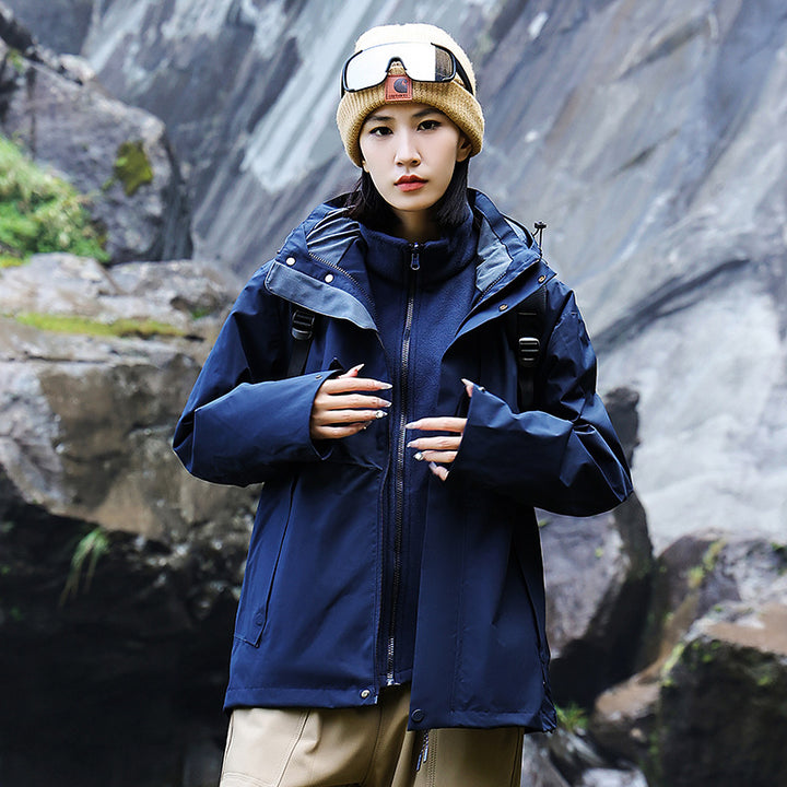 Women’s technical multi-layer hardshell rain jacket with adjustable hood, chest strap, and water-resistant zippers Amarae