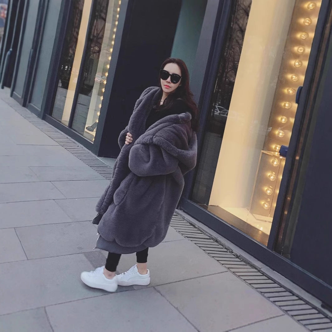 Oversized faux fur coat for women with hood and pockets Lune London