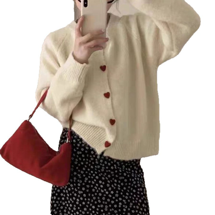 Ladies soft knit pullover with heart-shaped buttons Lune London