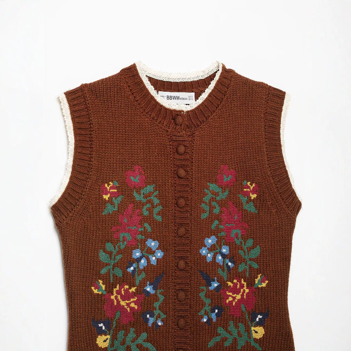 Women's sleeveless knitted vest with floral intarsias, button placket and crocheted hem Amarae