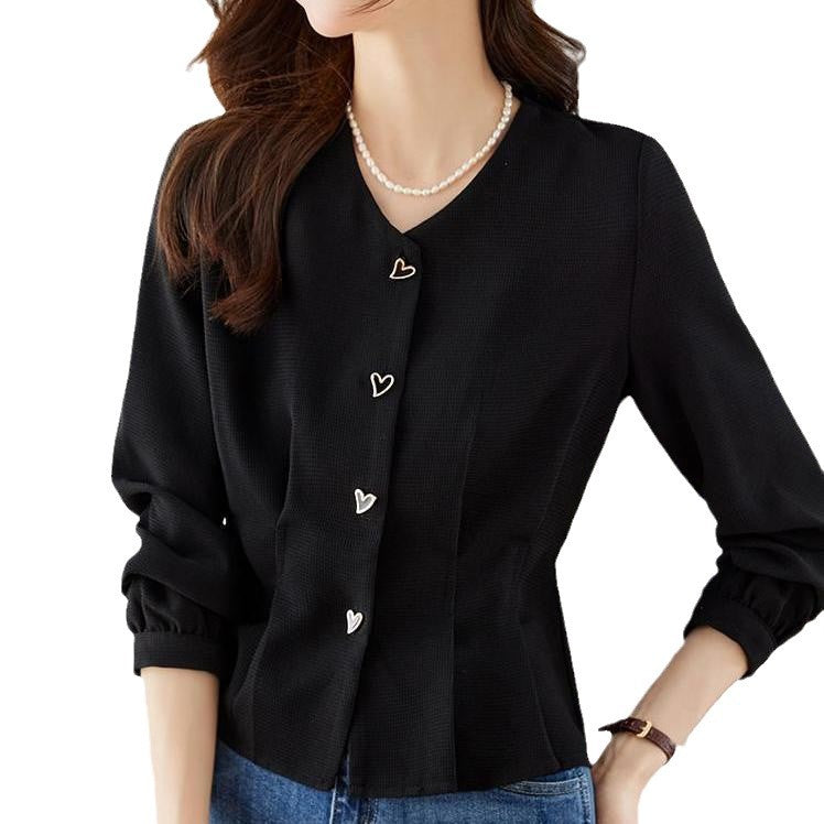 Blouse élégante pour femmes avec des détails de bouton en forme de cœur et des manches volumineuses Chic & Stil
