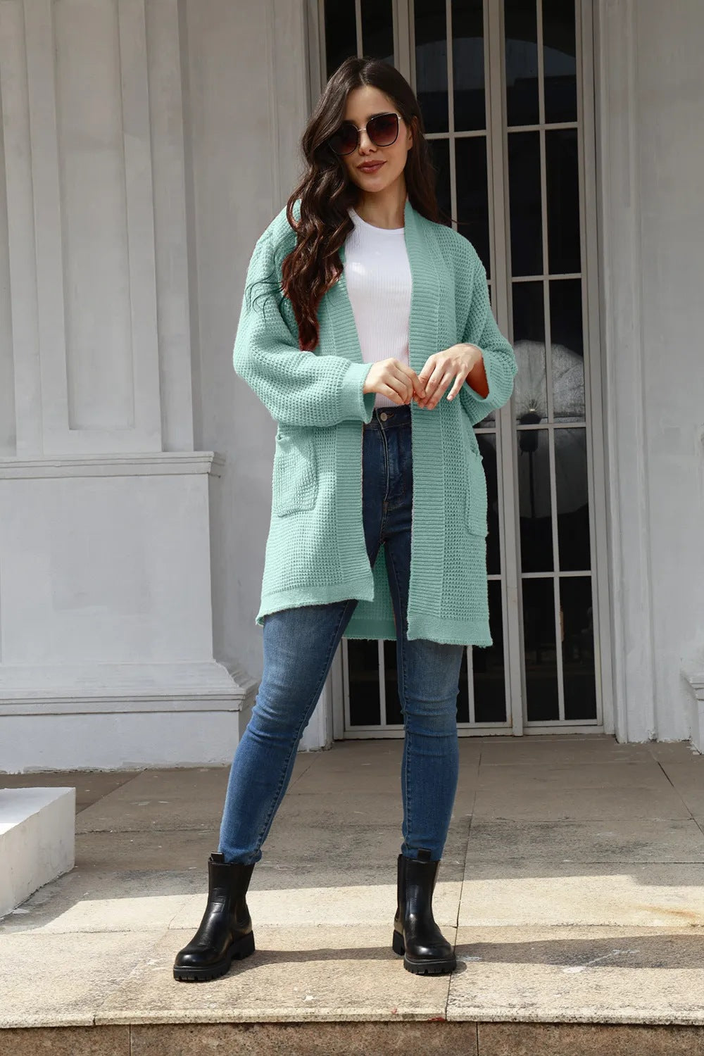 Casual knitted cardigan for women with practical pockets and open front Lune London