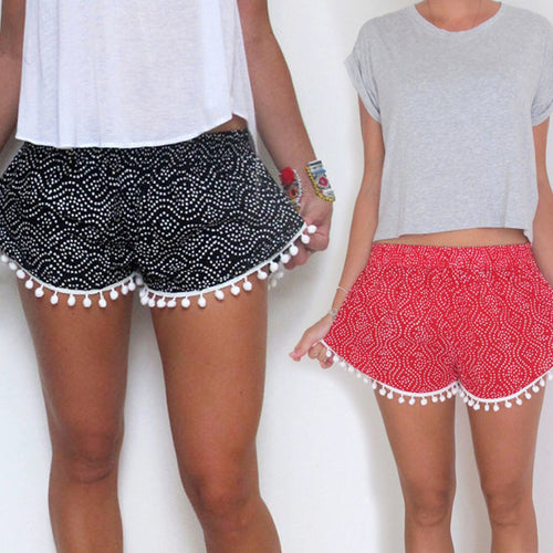 Shorts d'été pour femmes avec des détails de pompons ludiques et un motif de vagues tendance Chic & Stil