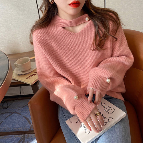 Pull en tricot pour femmes avec un look cut-out raffiné et des manches ornées de perles Amarae