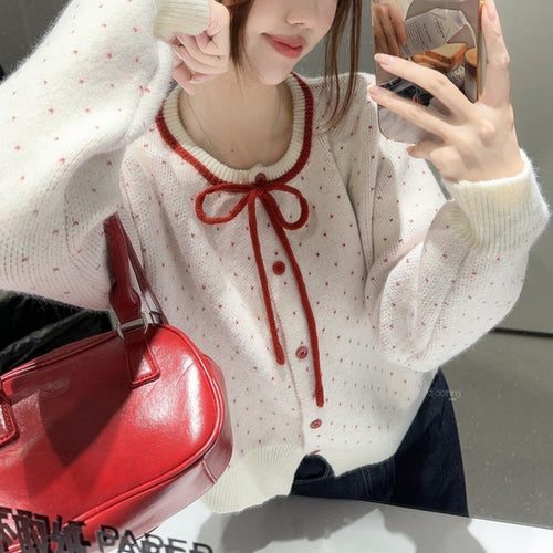 Cardigan féminin avec des pois et un nœud Chic & Stil