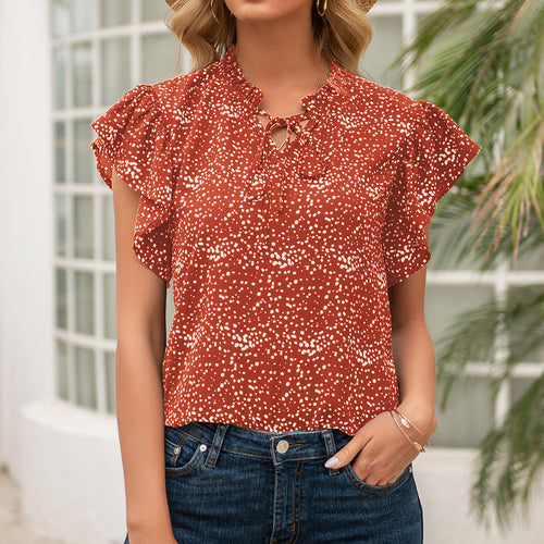 Women's blouse with ruffled sleeves and a woven polka dot pattern Amarae