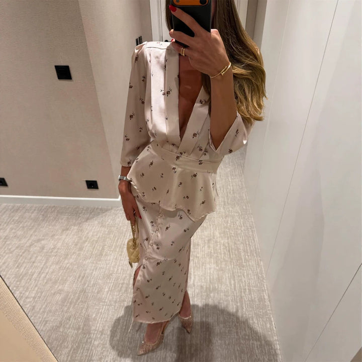 Women's satin two-piece set with tailored peplum top, deep V-neckline and button-up midi skirt Amarae