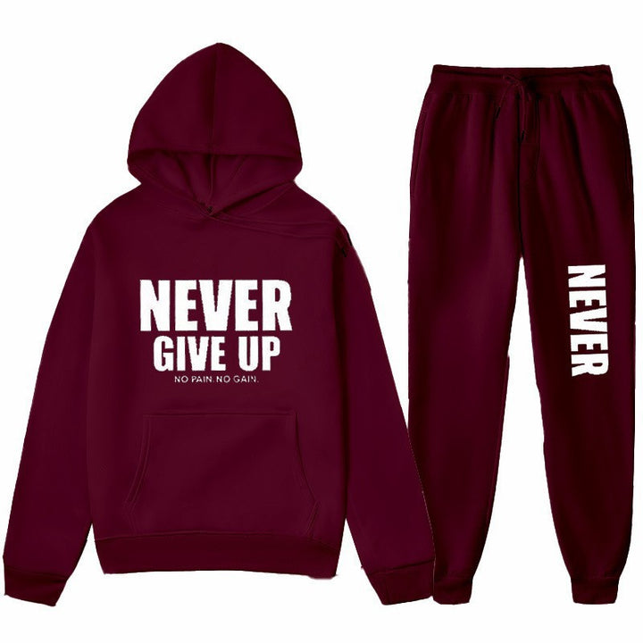 Women's training pullover and jogging pants in motif set with motivating print Chic & Stil