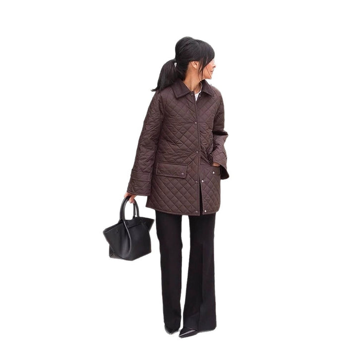 Women's oversized quilted jacket in coat style with snap button placket and patch flap pockets Amarae