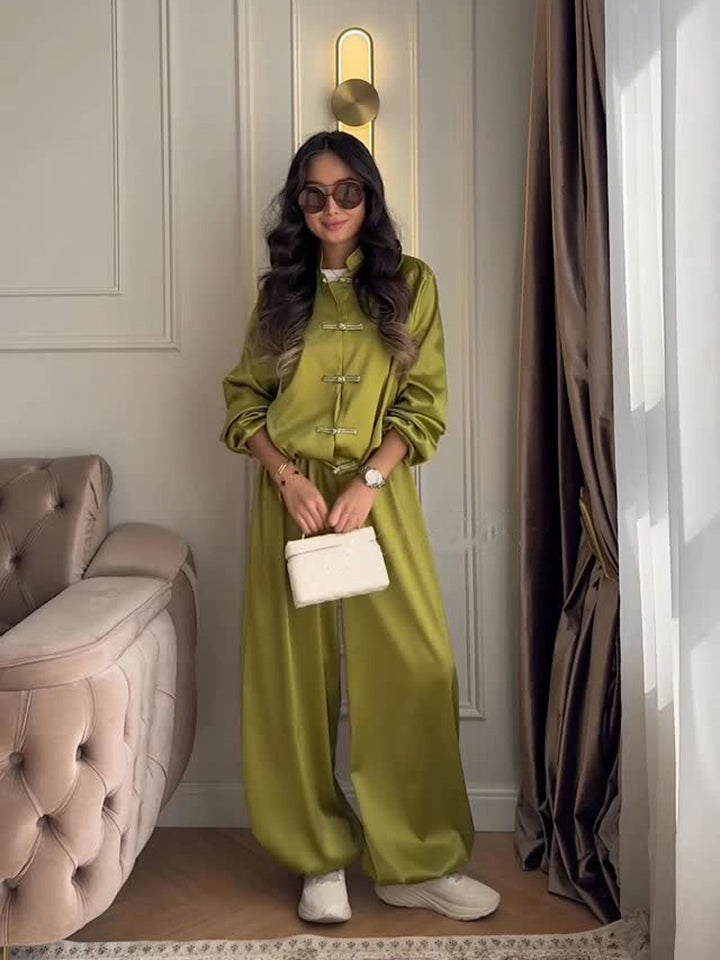 Women’s satin two-piece with traditional toggle closures and wide pants skirt Amarae