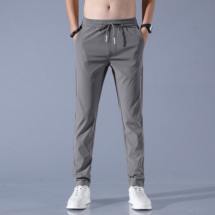 Men's sports pants with adjustable drawstring and zippered pockets on the sides Lune London