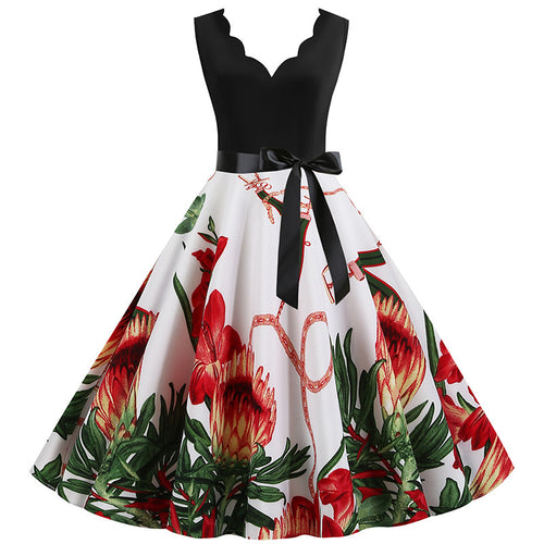 Robe midi femme avec imprimé floral romantique et coupe évasée flatteuse Chic & Stil