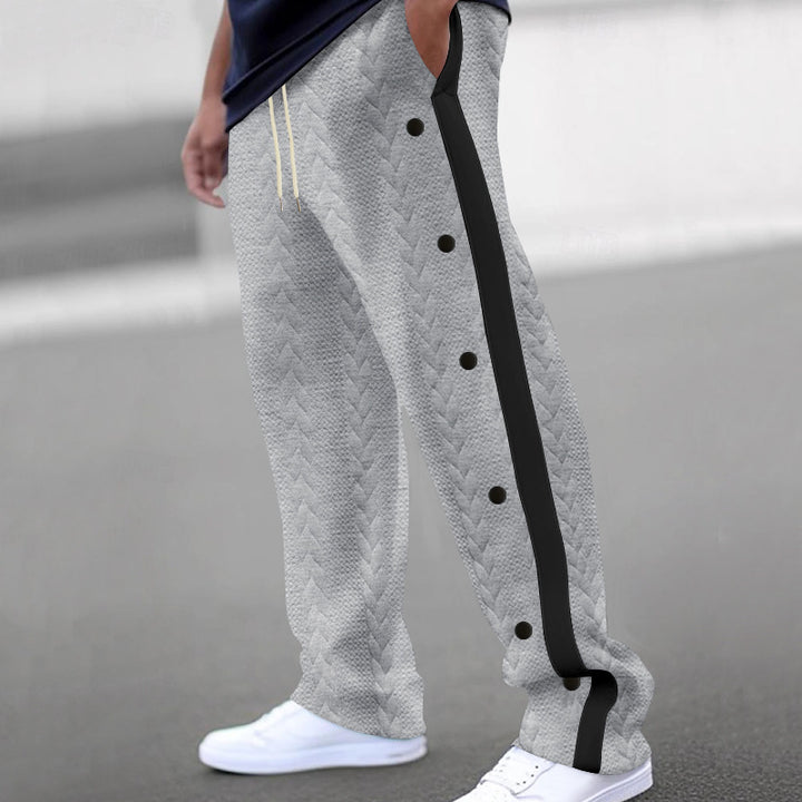 Men's athletic leisure pants with snap buttons and structured design Lune London