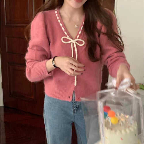 Ladies soft pullover with contrasting buttons and elegant details Amarae