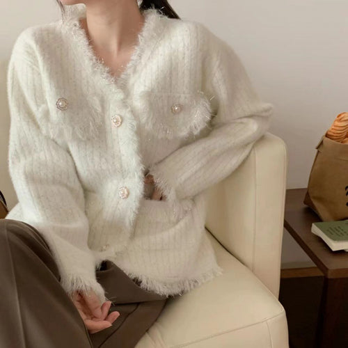 Cardigan pour femmes avec perles décoratives et détails frangés Chic & Stil