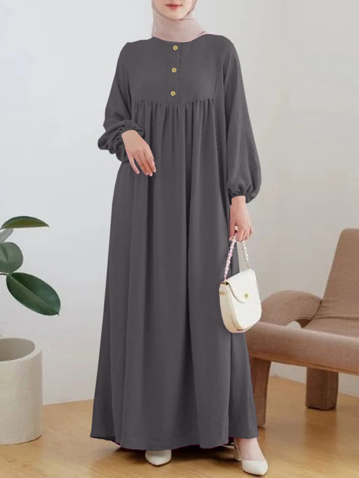 Lightweight maxi dress for women with comfortable buttoning and elegant puff sleeves Lune London