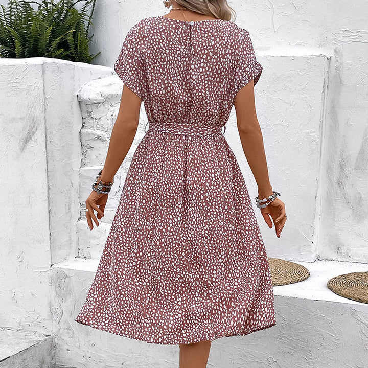Stylish belted button midi dress for women with elegant polka dots Lune London