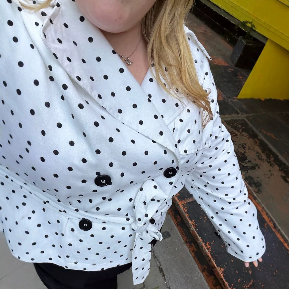 Women’s short trench coat with double breasted front, belt at the waist and polka dot print Amarae