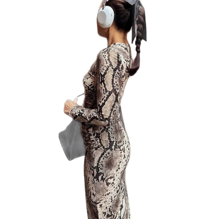 Women's figure-hugging maxi dress made of stretch jersey with snake print and round neckline Amarae