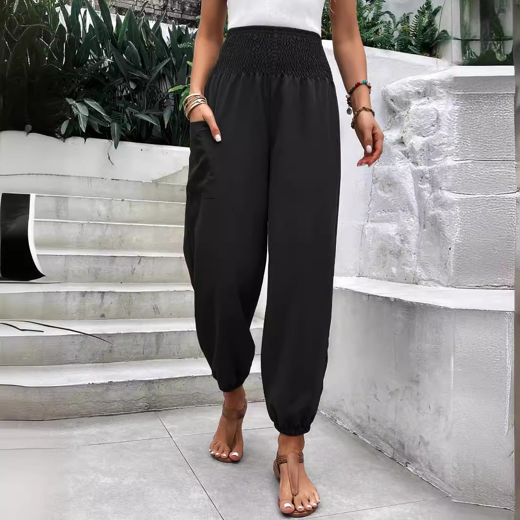 High-waisted leisure trousers for women with elastic waist and practical side pockets Lune London