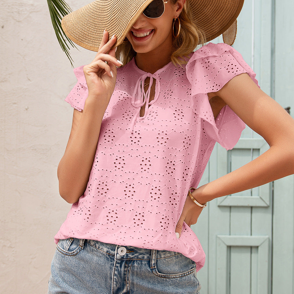 Women's blouse with ruffle details and a perforated pattern Lune London