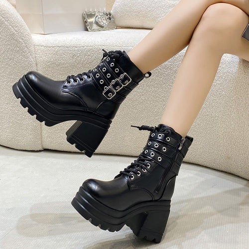 Chunky boots for women with decorative straps and a sturdy profile Amarae