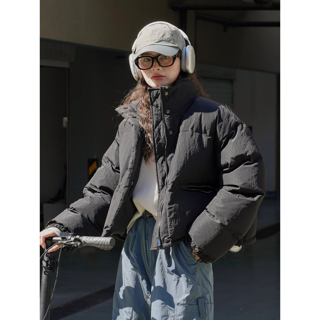 Women's short-cut padded down jacket with high collar and matte nylon surface Amarae