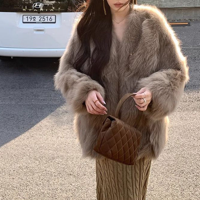 Veste en fausse fourrure à la mode pour femmes avec des détails de bouton élégants Chic & Stil