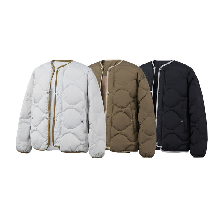 Unisex Kastig padded short jacket with circular quilting, round neckline and contrast piping Amarae