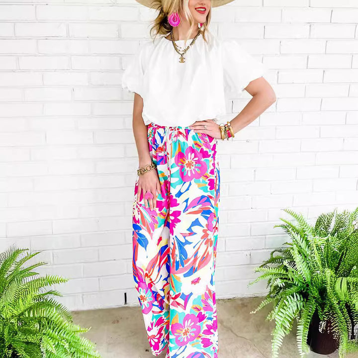Leisure pants for women, wide, with a colorful floral pattern and an elastic waistband Lune London