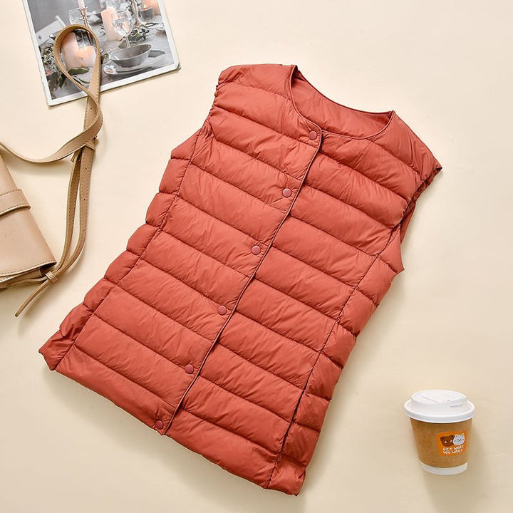 Women's sleeveless quilted thermal vest with round neck and snap button placket Amarae