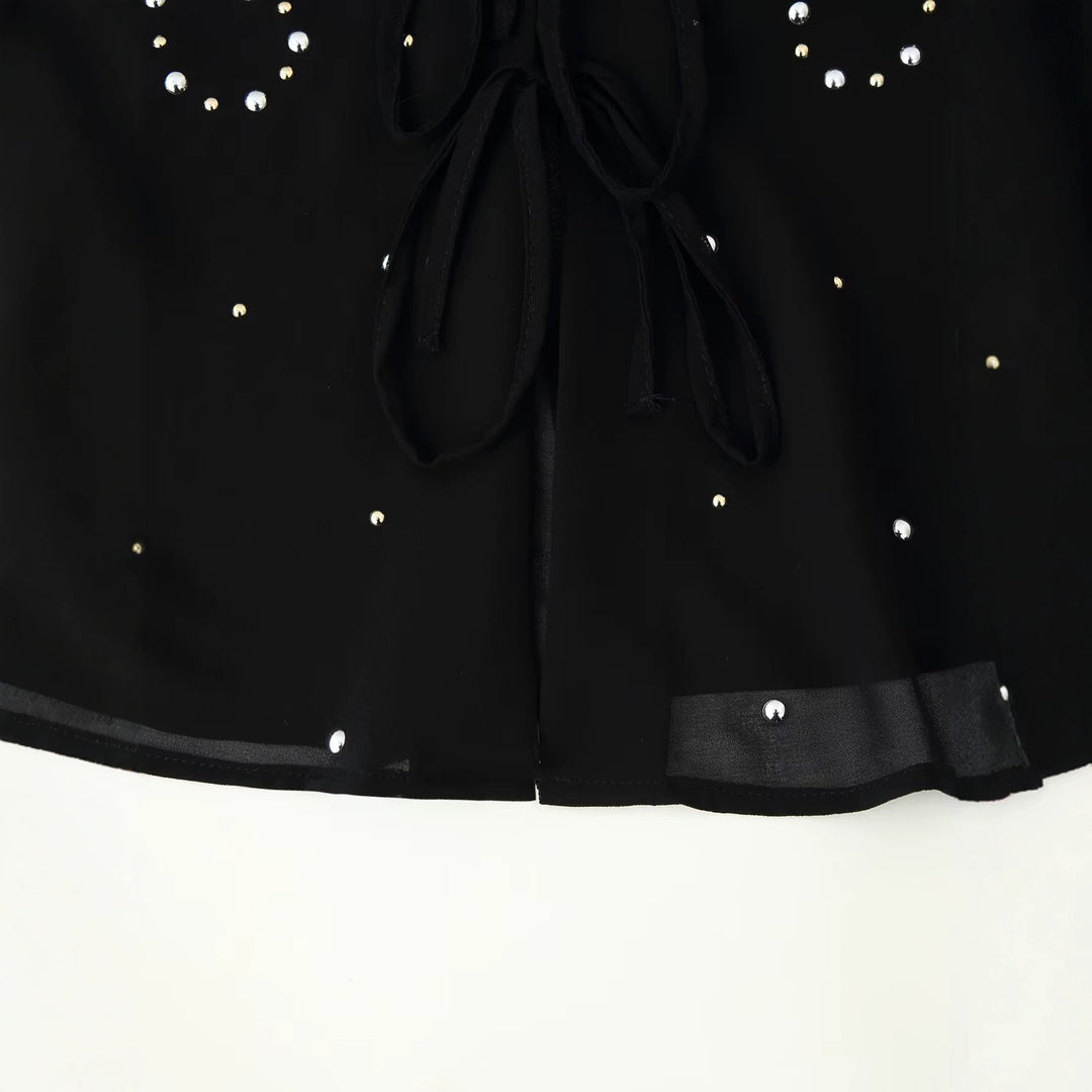 Women’s chiffon blouse with sequin trim, deep V-neck and decorative tie bands Amarae