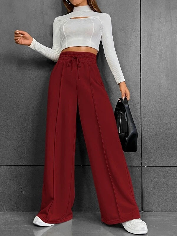 Wide sports pants for women with elastic waistband and side pockets Lune London